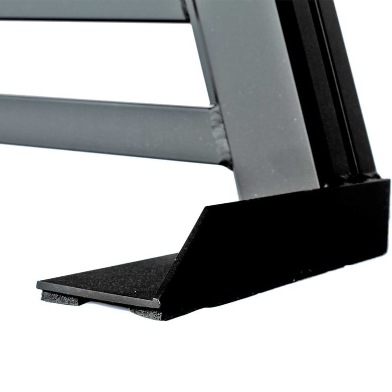 A black mounting foot for a magnum truck rack
