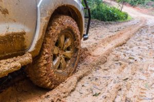 Truck Driving Through Mud