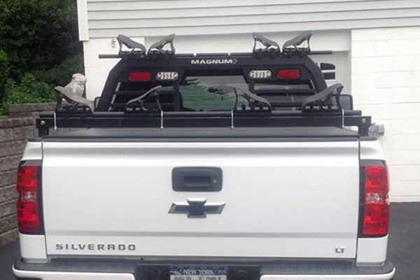 Chevy Silverado with a Magnum headache rack, extension tube, and cargo stops in place.