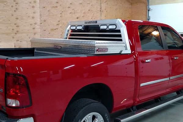 Dodge Ram 3500 with Magnum Low Pro rack and cross body toolbox installed.