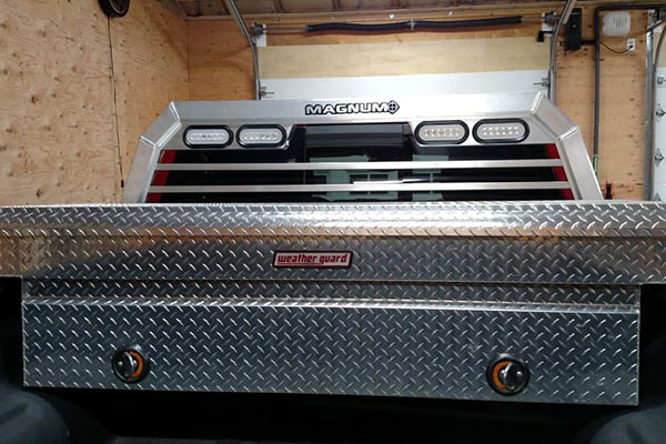 Cross body toolbox and Magnum headache rack installed in Ram pickup.
