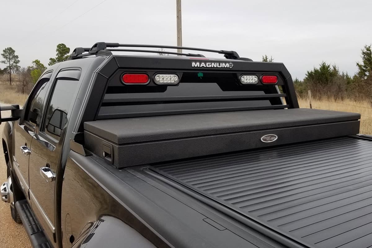 GMC 3500 with a Magnum Low Pro rack, a tool box, and tonneau cover all installed.