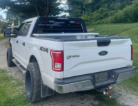 2017 Ford F-150 with low pro headache truck rack by Magnum